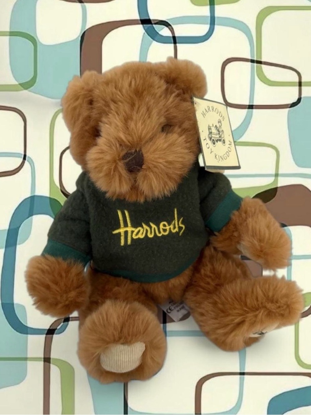 Harrods brown teddy bear with green sweater